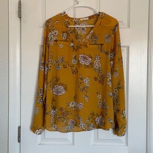 Maurices, women’s large, long sleeve blouse.